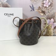 Celine Small Drawstring Bag In Triomphe Canvas And Calfskin